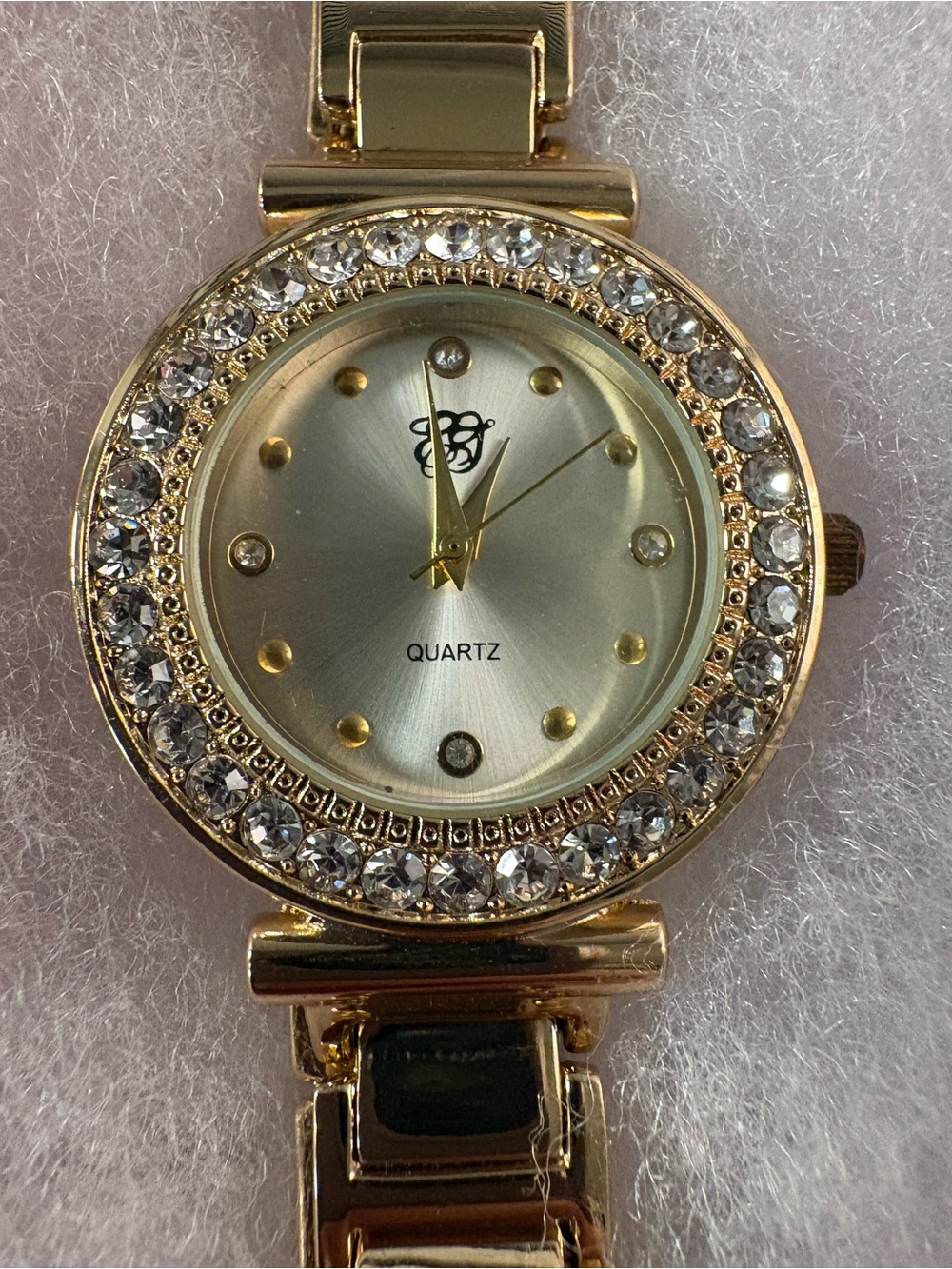 Vintage Elizabeth Taylor White Diamonds Gold Tone Rhinestone Watch ET Logo 90s